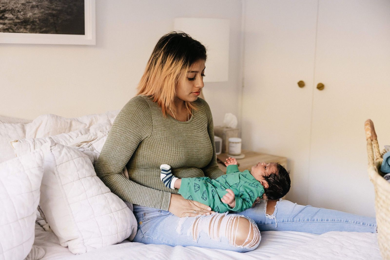 Mother Holding Baby on Lap