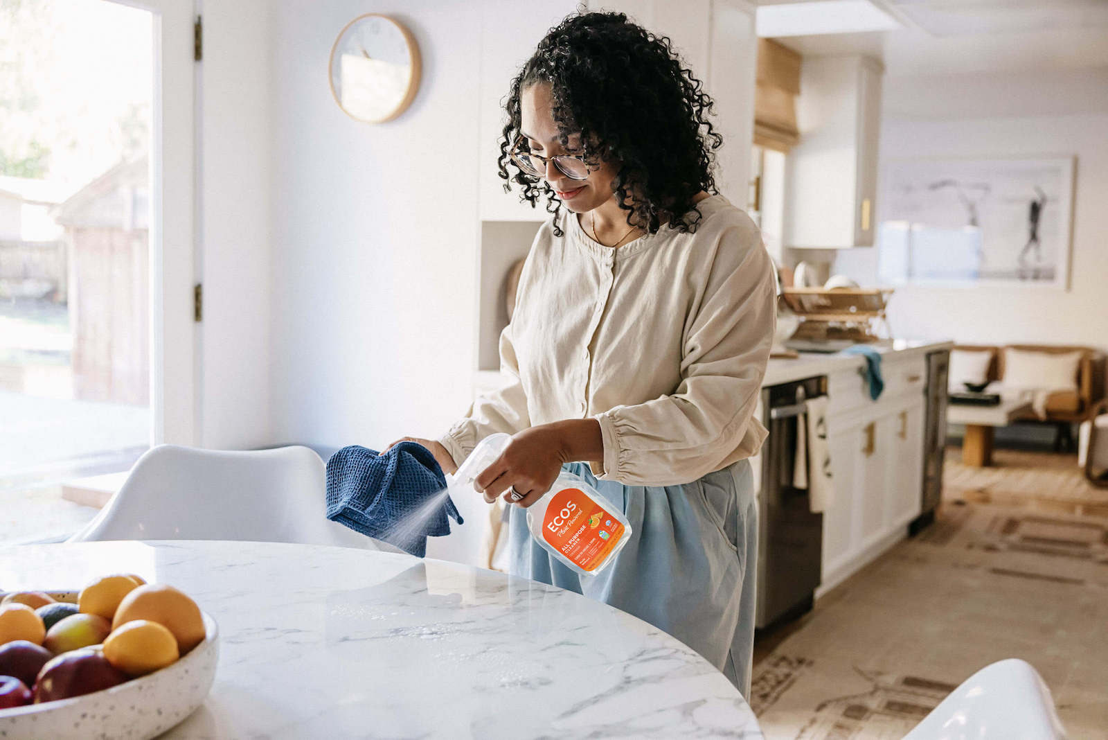 Spraying Orange All Purpose Cleaner